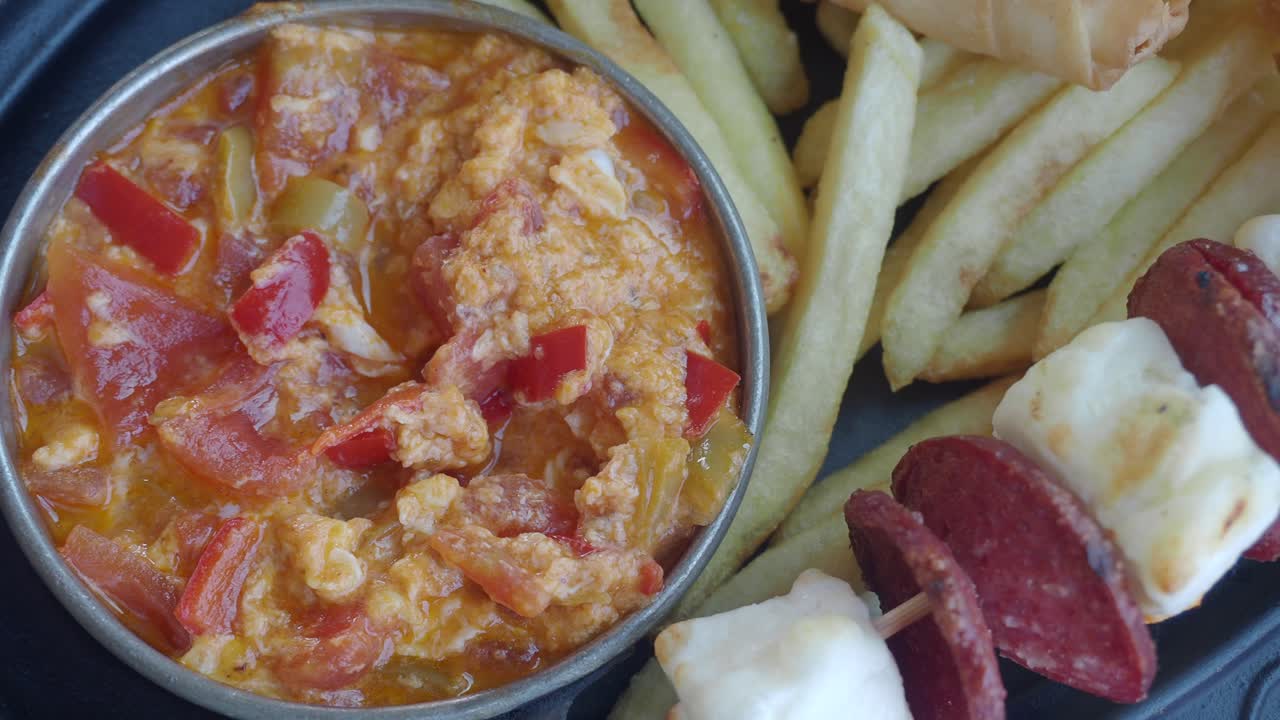 Turkish Breakfast with Menemen, Fries, and Sausages
