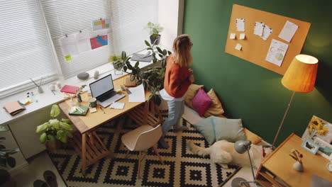 woman working from home, cozy home office setup