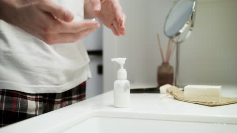 unrecognizable man in the bathroom