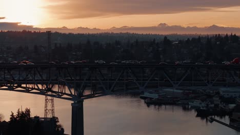 Fiery-Sunset-and-Freeway:-Tracking-Shot-of-I-5-with-Olympic-Mountains-Backdrop