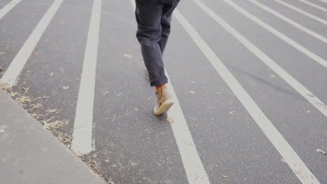 walking behind male in shopping center.