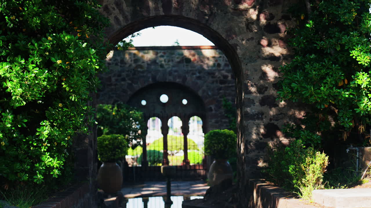 View of the gardens of the Chateau de la Napoule Castle in Mandelieu-La Napoule, France n daylight