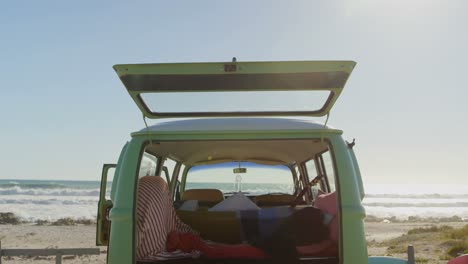 van parked at beach on sunny day 4k