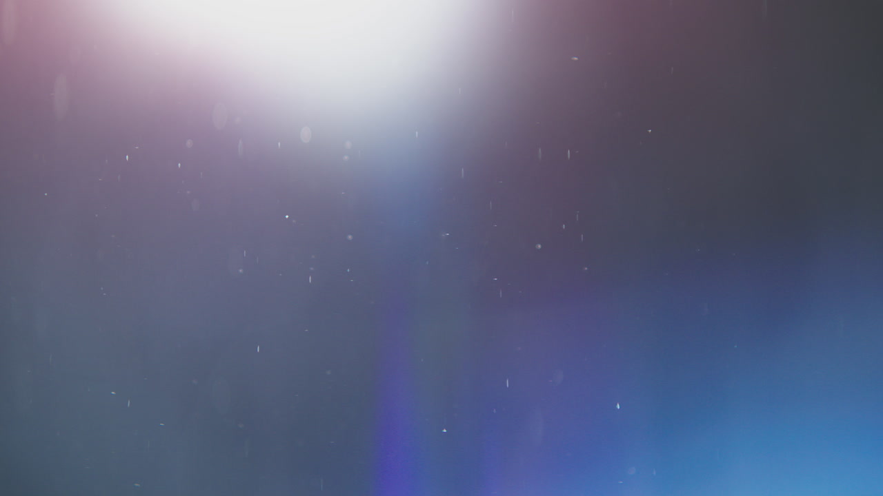 destello de la lente abstracta y partículas de polvo