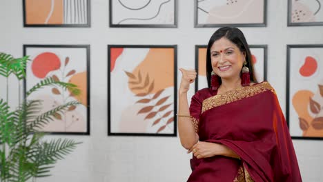 Indian-woman-pointing-for-product-placement