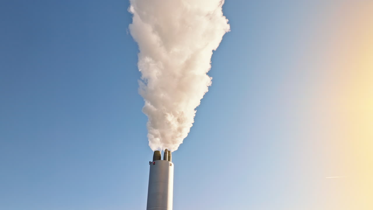 Aerial drone view of CopenHill artificial ski slope on the roof of an energy plant