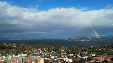 Cityscape By The Port Of Tacoma Overlooking The Commencement Bay With Rainbow In Background At Washington, USA
