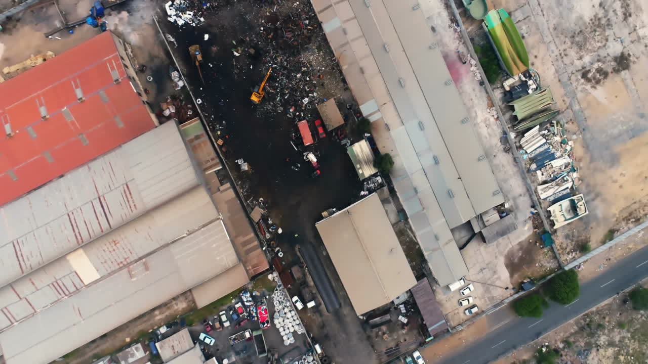 Aerial view of industrial area with recording animation overlay