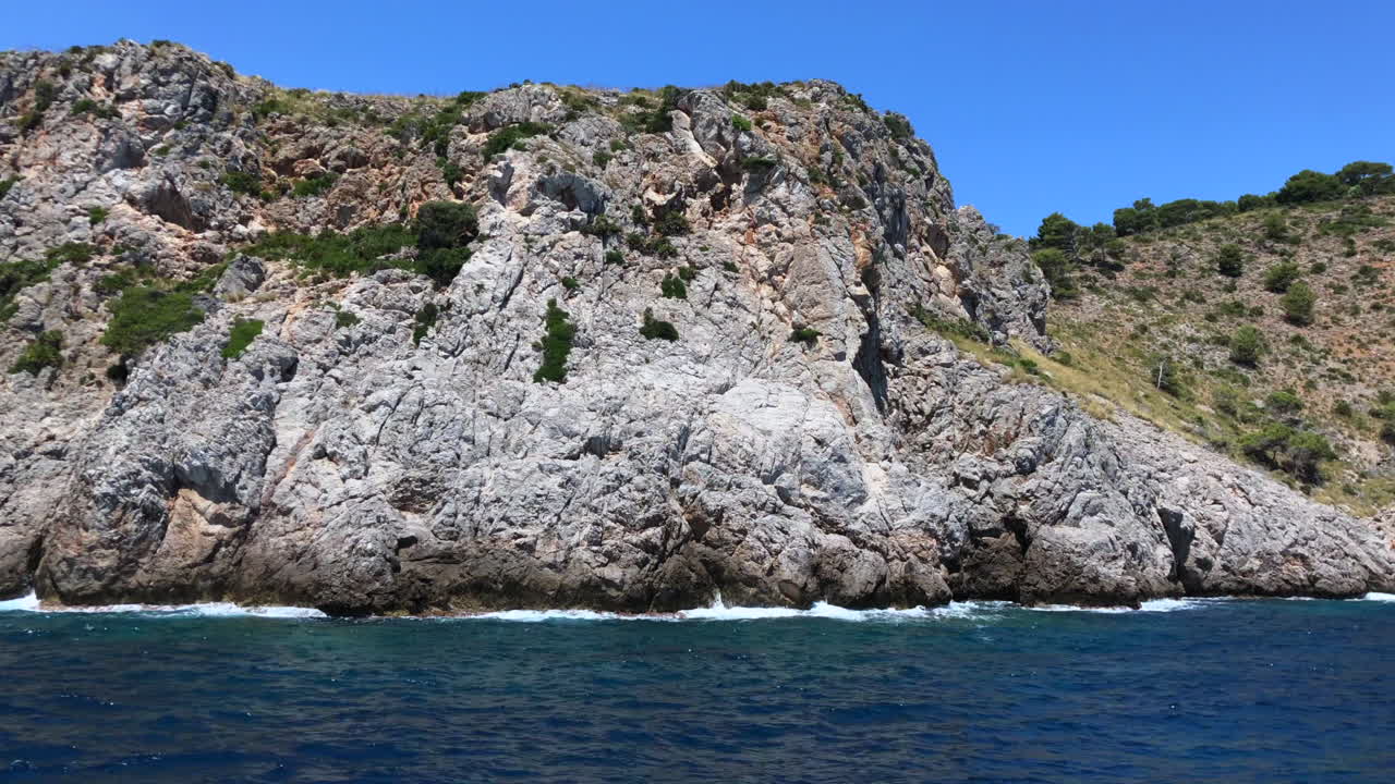 Boat trip along the coast of Palma De Mallorca on a sunny summer day