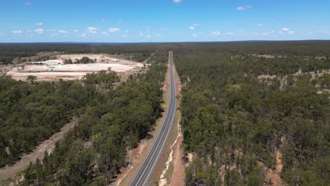 aerial view of a remote australian highway through the outback