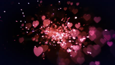 animación de corazones rojos que caen y fuegos artificiales rojos brillantes sobre un fondo negro