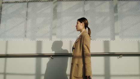 woman walking through airport