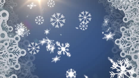 Animation-of-christmas-snowflakes-falling-over-blue-background