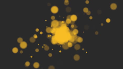 Motion-gold-glitters-and-round-bokeh-on-black-background