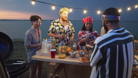 young people buying street food on open air festival