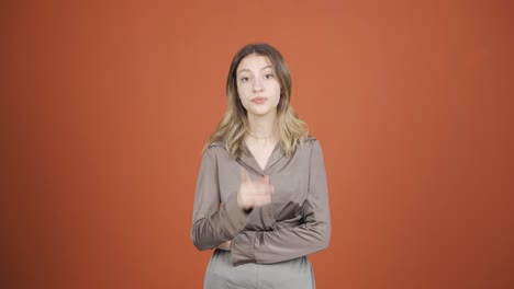 Young-woman-getting-angry-at-camera.