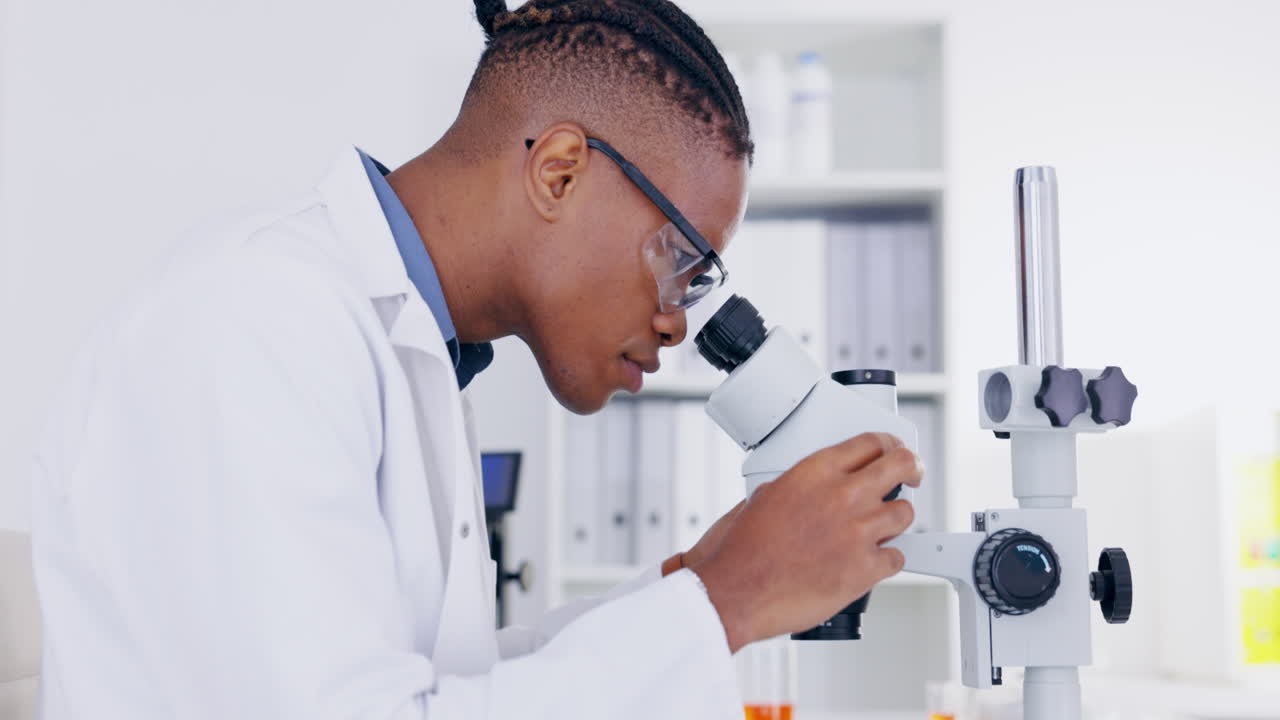 Science, microscope and breakthrough with a doctor