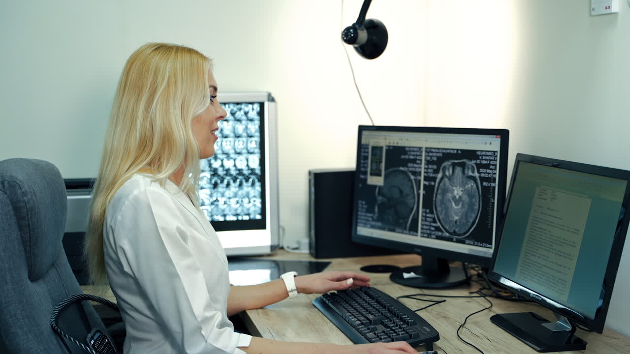 Female Doctor Reviewing Medical Images