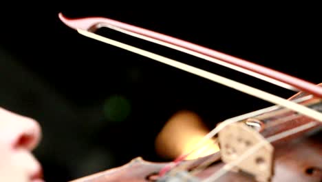 violinist playing - closeup of her hands