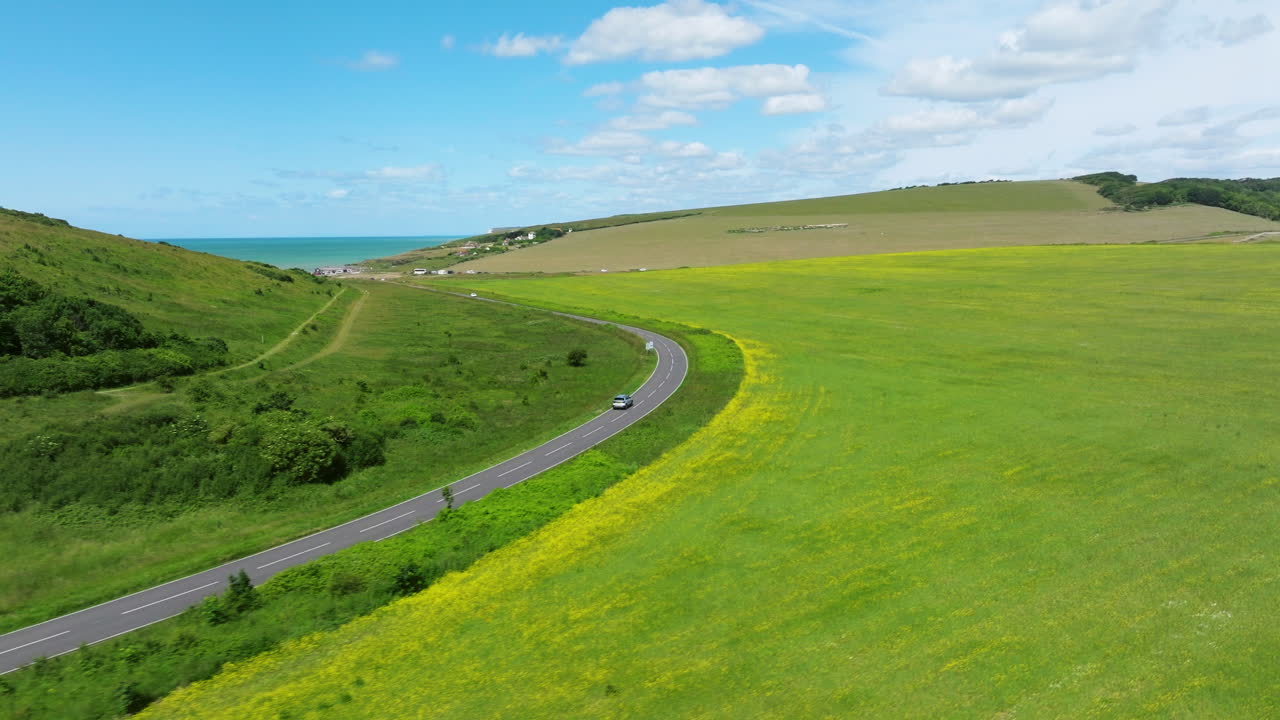 Scenic Country Road To The Seven Sisters Cliffs In East Sussex, England. Aerial Drone Shot