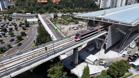 intercity train from mexico city to toluca pulling into santa fe station