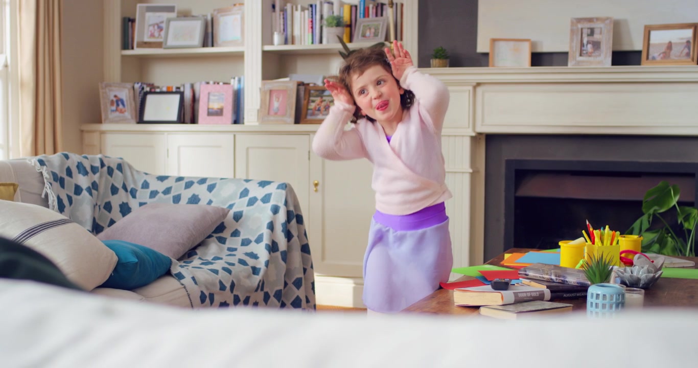 Little Girl Dancing and Playing in Living Room