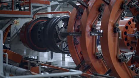 automated robotic tire manufacture machine moving at automotive workshop