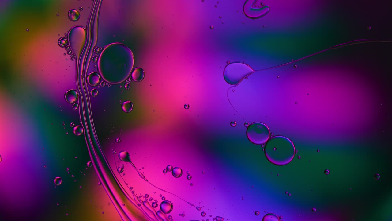 абстрактные красочные пищевые капли масла пузырьки и сферы текут