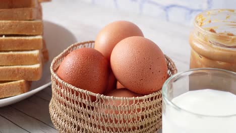 breakfast with eggs, bread, milk and peanut butter