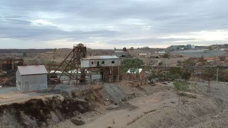 drone flying over the junction mine headframe