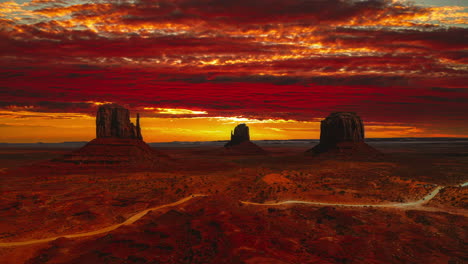 beautiful vibrant sunset time-lapse in good weather at the famous west mitten butte tea kettle rock among the monument valley landmarks in utah - arizona, america - usa