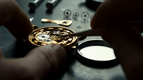 mechanical watch repair. watchmaker is repairing the mechanical watches