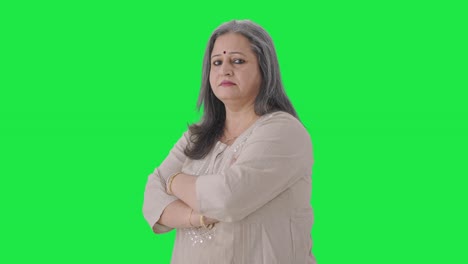 Portrait-of-Indian-old-woman-standing-crossed-hands-Green-screen