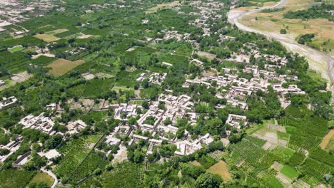 drone footage of kapisa towns and lush green fields