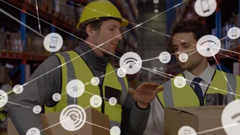 Animation-of-network-of-connections-with-icons-over-men-working-in-warehouse