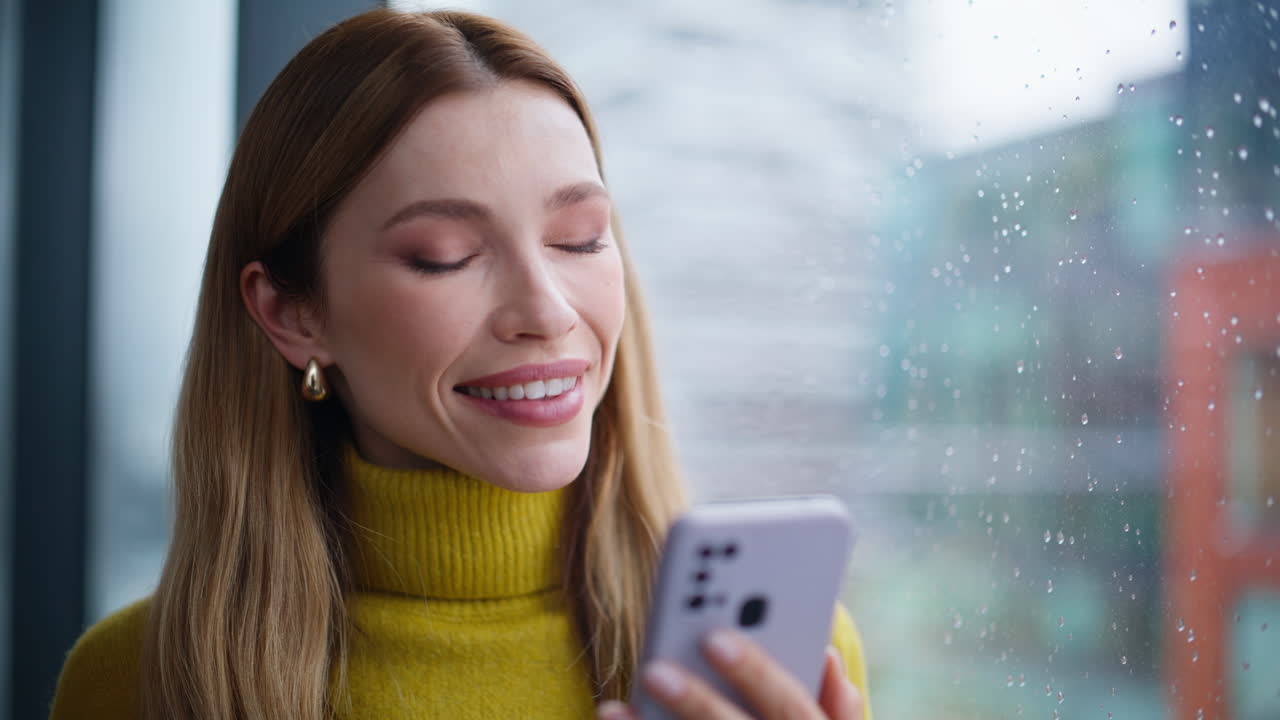 Woman choosing purchases cellphone touching screen by finger in office closeup