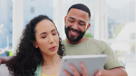 Couple,-tablet-and-happy-on-home-sofa-together