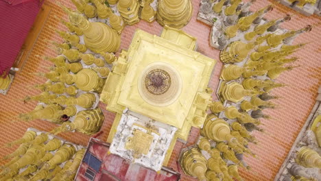 Top-Down-Aerial-Circling-Around-the-Inn-Tain-Pagoda-at-Inle-Lake,-Myanmar