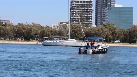 boat fishing near gold coast shoreline