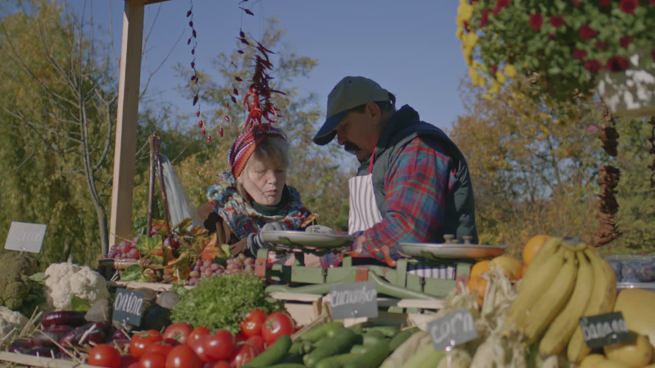Couple Elderly Farmers Making Lunch Break Couple of Elderly Farmers Making Lunch Break Tasting Meat Cooked by Neighbor and Feeling Happiness by Engaging Favorite Job Weekend on Local Farmers Market Vegetarian and Organic Food Agriculture