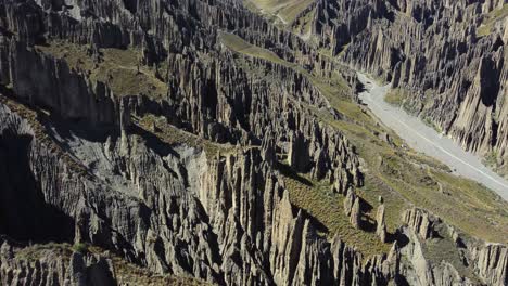 flyover dramatic geology, valley of rocks, eroded spires in bolivia