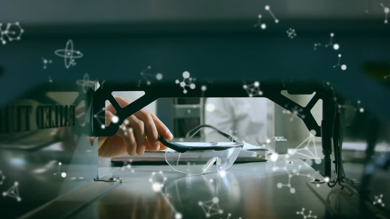 남성 과학자 위에 떠다니는 분자의 애니메이션