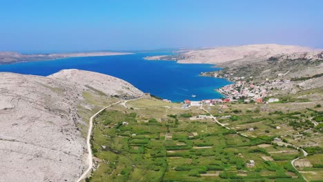 Wide-aerial-view-of-coastal-town-in-Krk,-Croatia