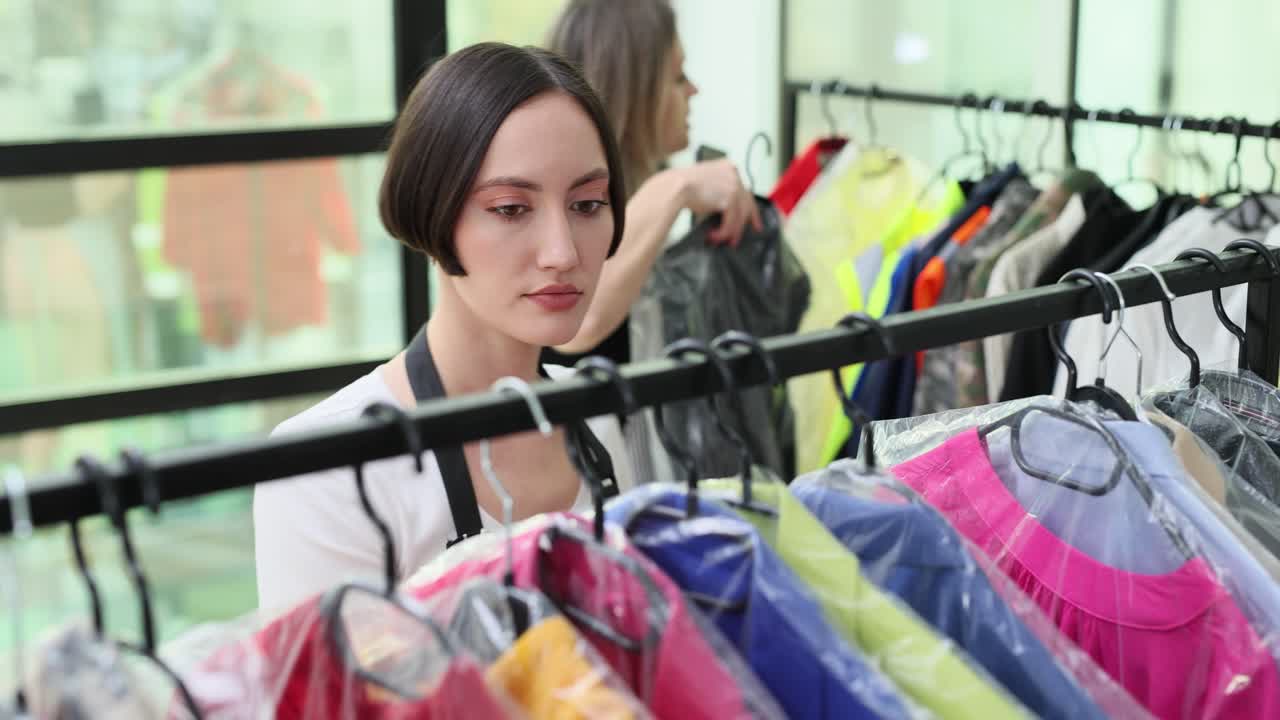 Neat rows of protected clothing being sorted with gloves