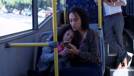 commuters using mobile phone while travelling in bus 4k