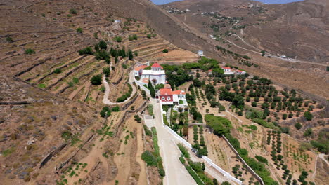 aerial: flying over the monastery of saint barbara in ermoupoli city of syros island, greece