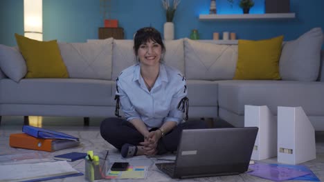 home office worker woman nods to the camera.