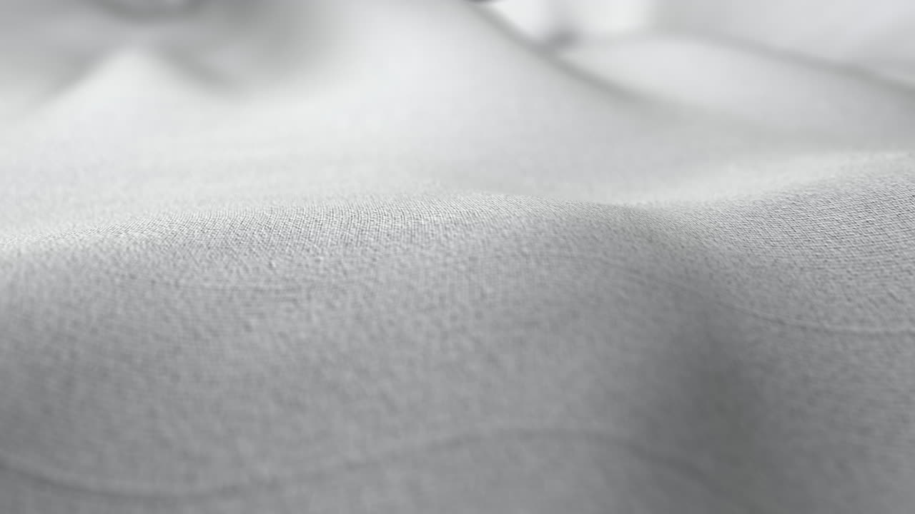 ミニマルな流れる背景ループを生み出す、かすかな布の波紋。