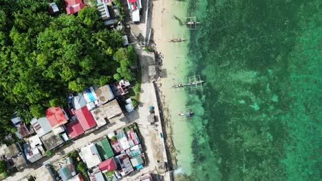 top view of philippine canoe boats anchored and beached on shore of baras catanduanes philippines