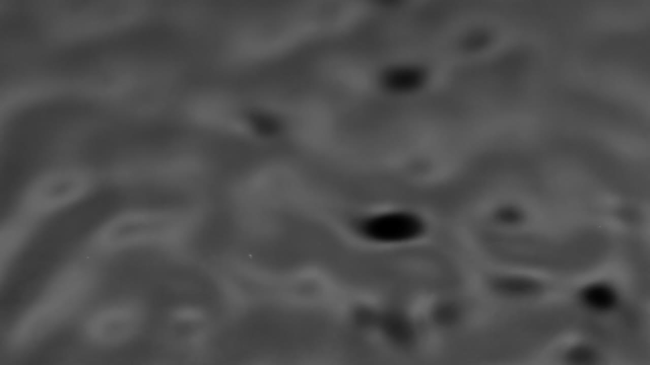 salpicaduras y gotas en la superficie del líquido. abstracto fondo negro vibración del agua. 4k cámara lenta 100 fps, prores 422, 10 bits